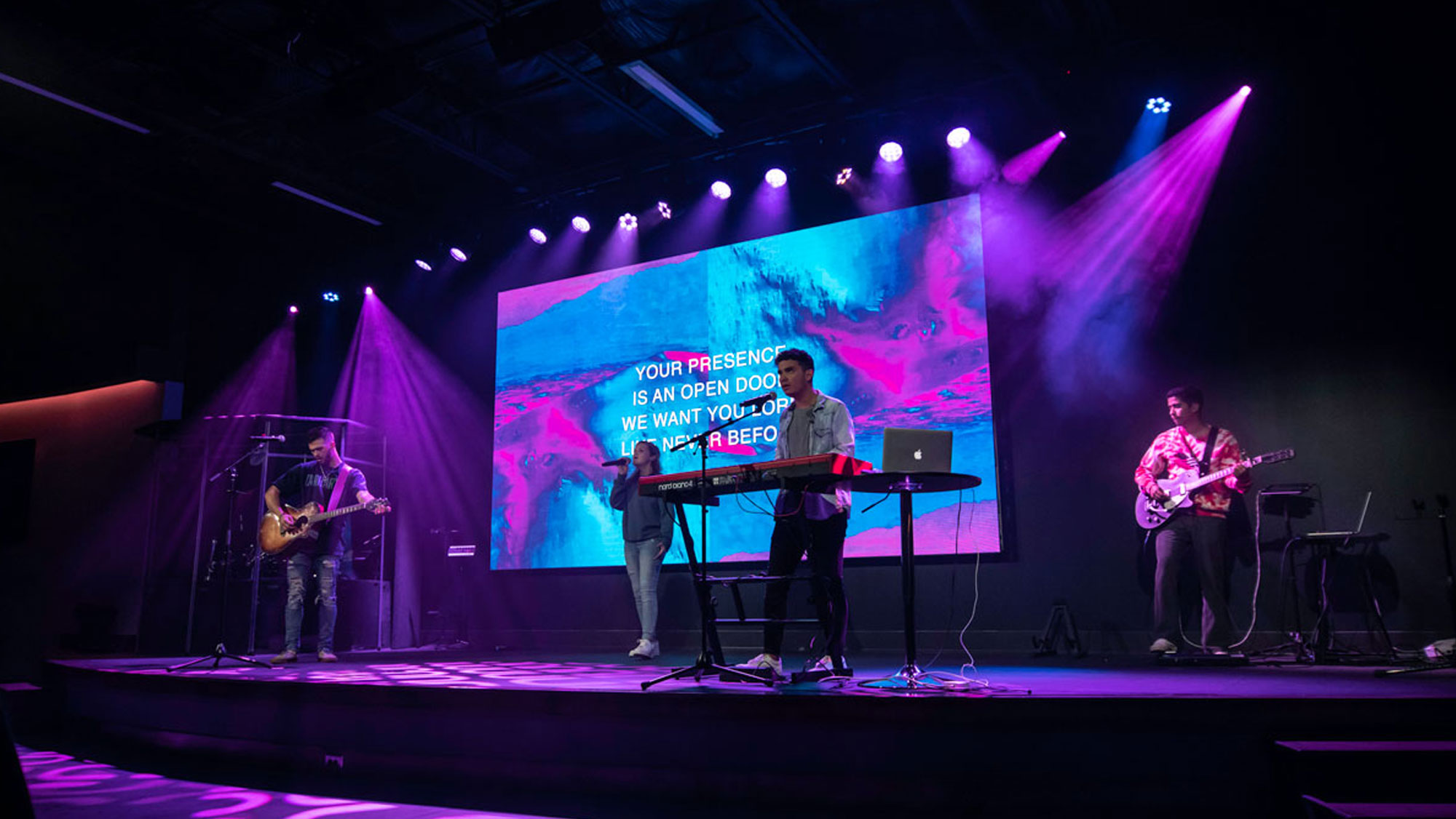 Worship band performing in front of LED wall